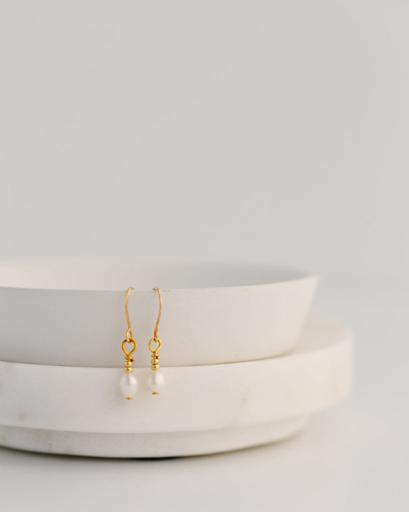 tiny gold and pearl drop earrings
