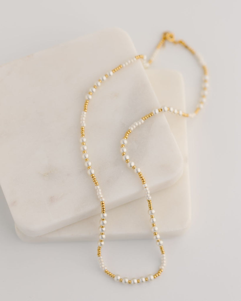 pearl and gold bead necklace