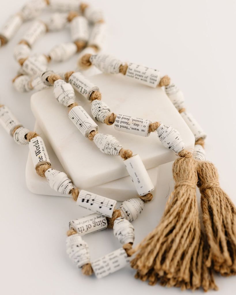 garland made from recycled hymnals with twine tassels