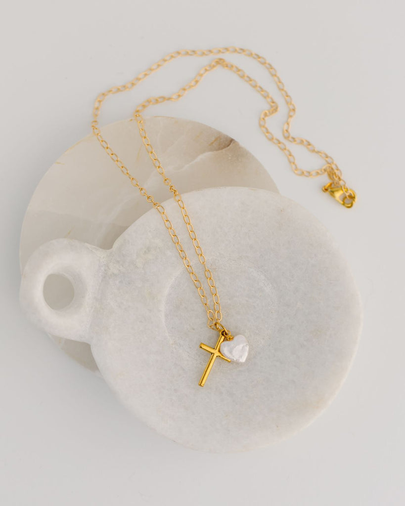 womens gold cross and pearl heart necklace